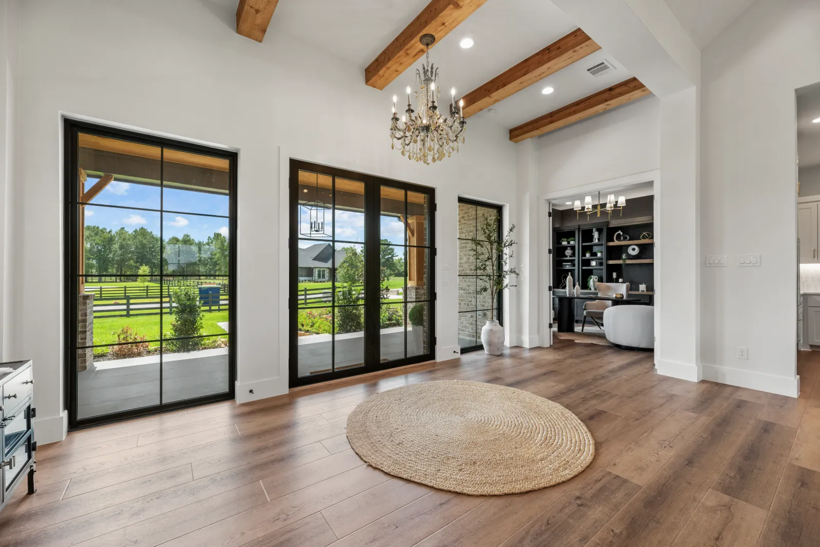 Home study with built-in shelving off the front entry