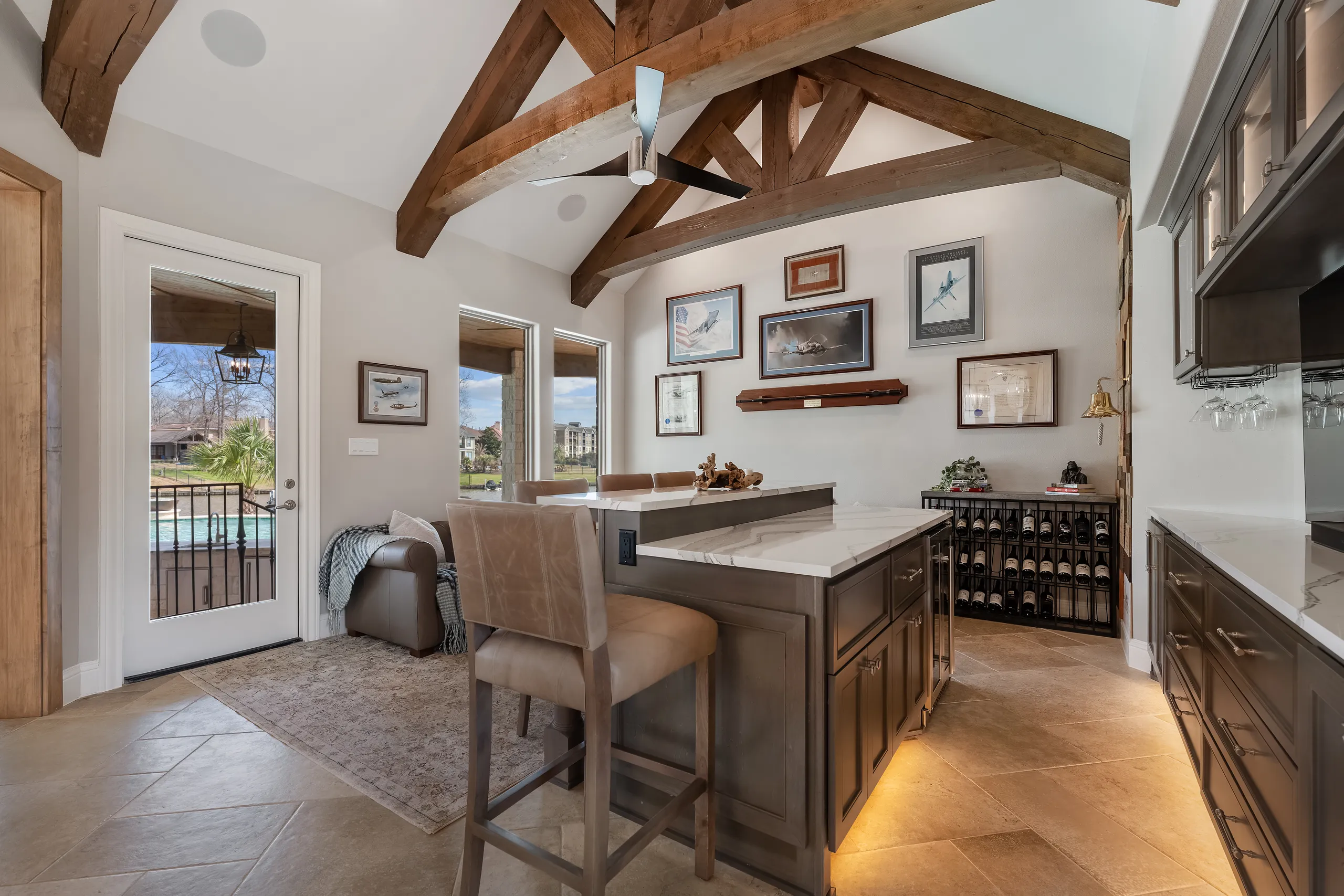 Wet bar and lounge under timber trusses