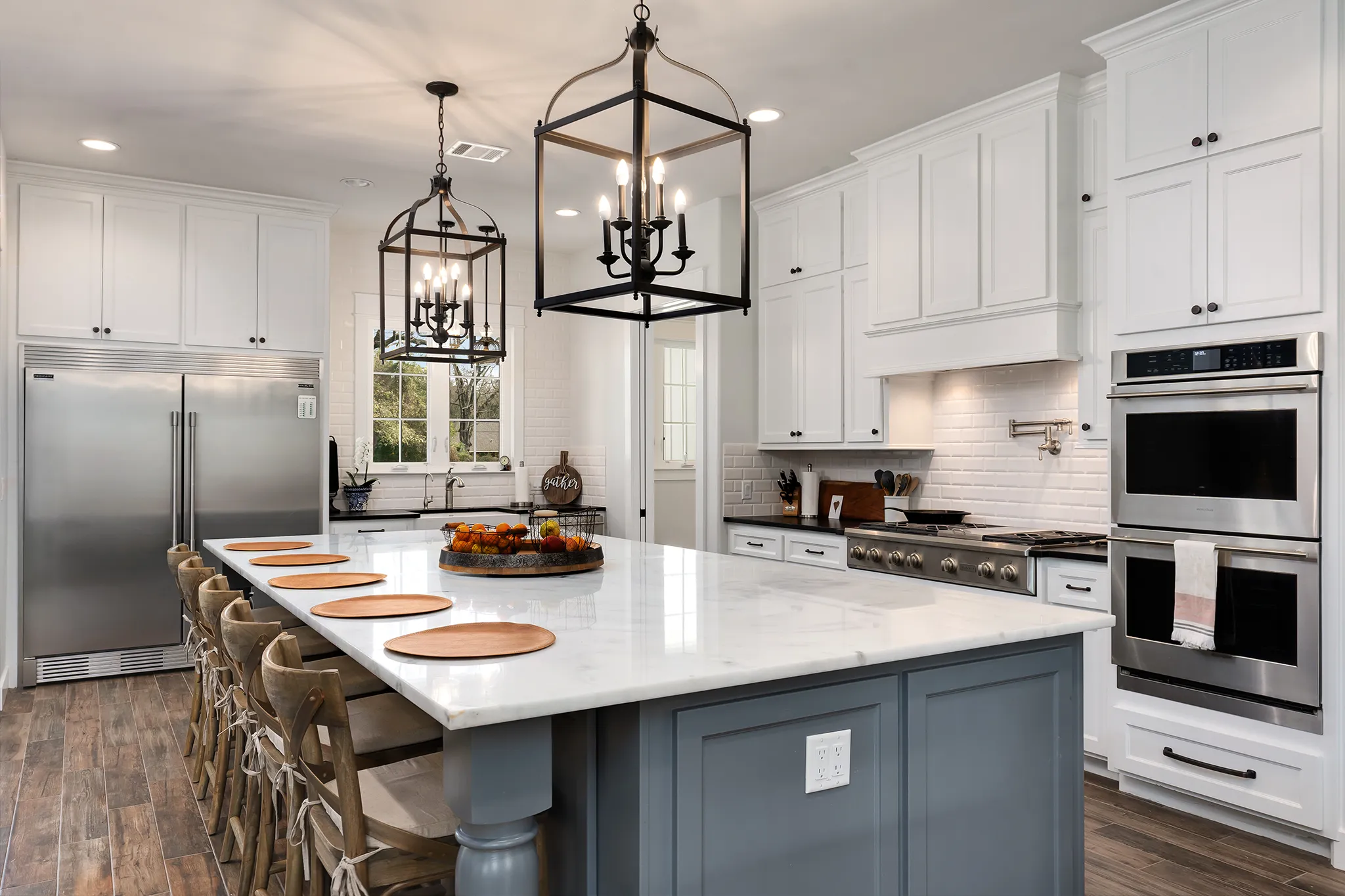 Blue island kitchen with lantern pendants