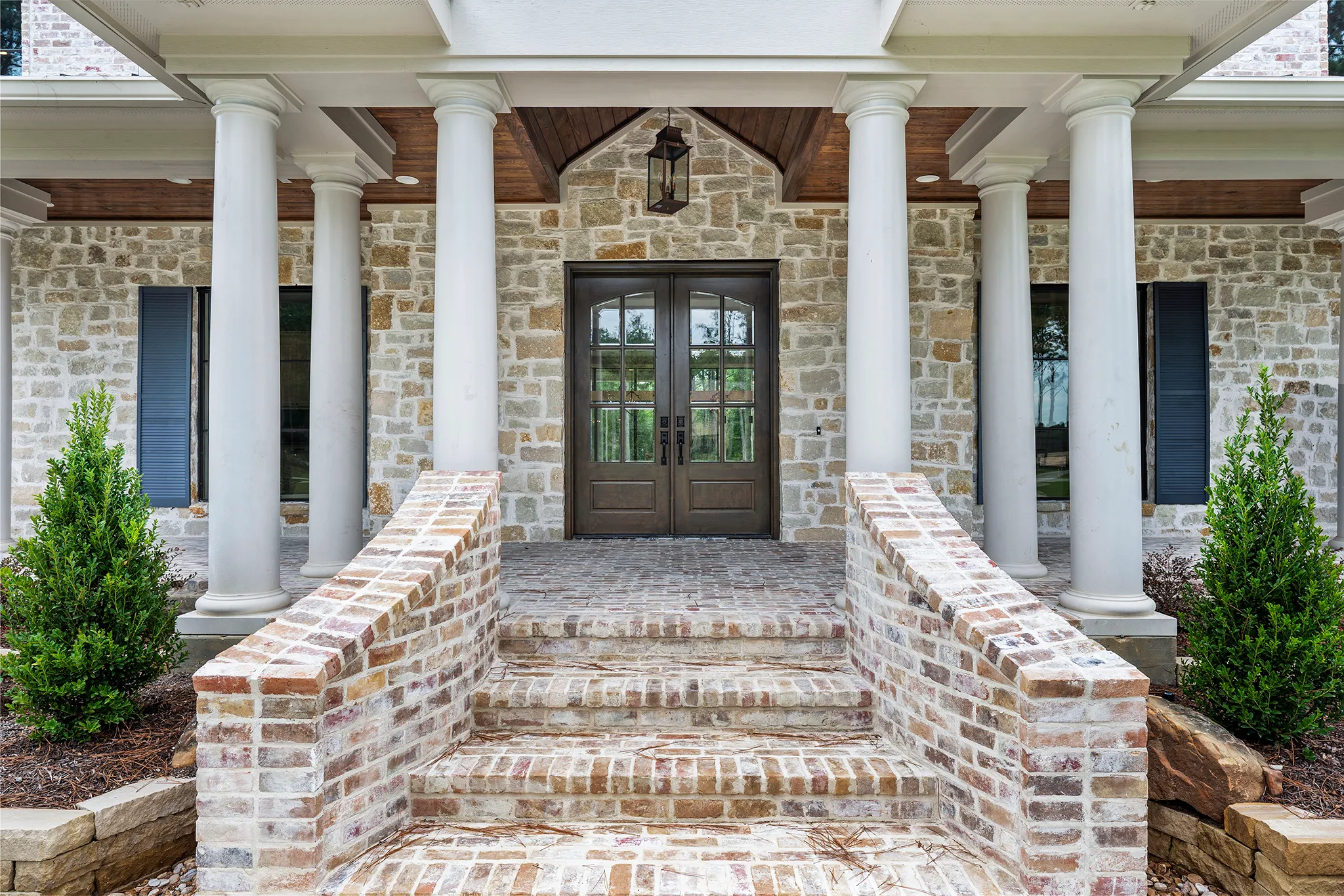 Two-story entry with soaring windows