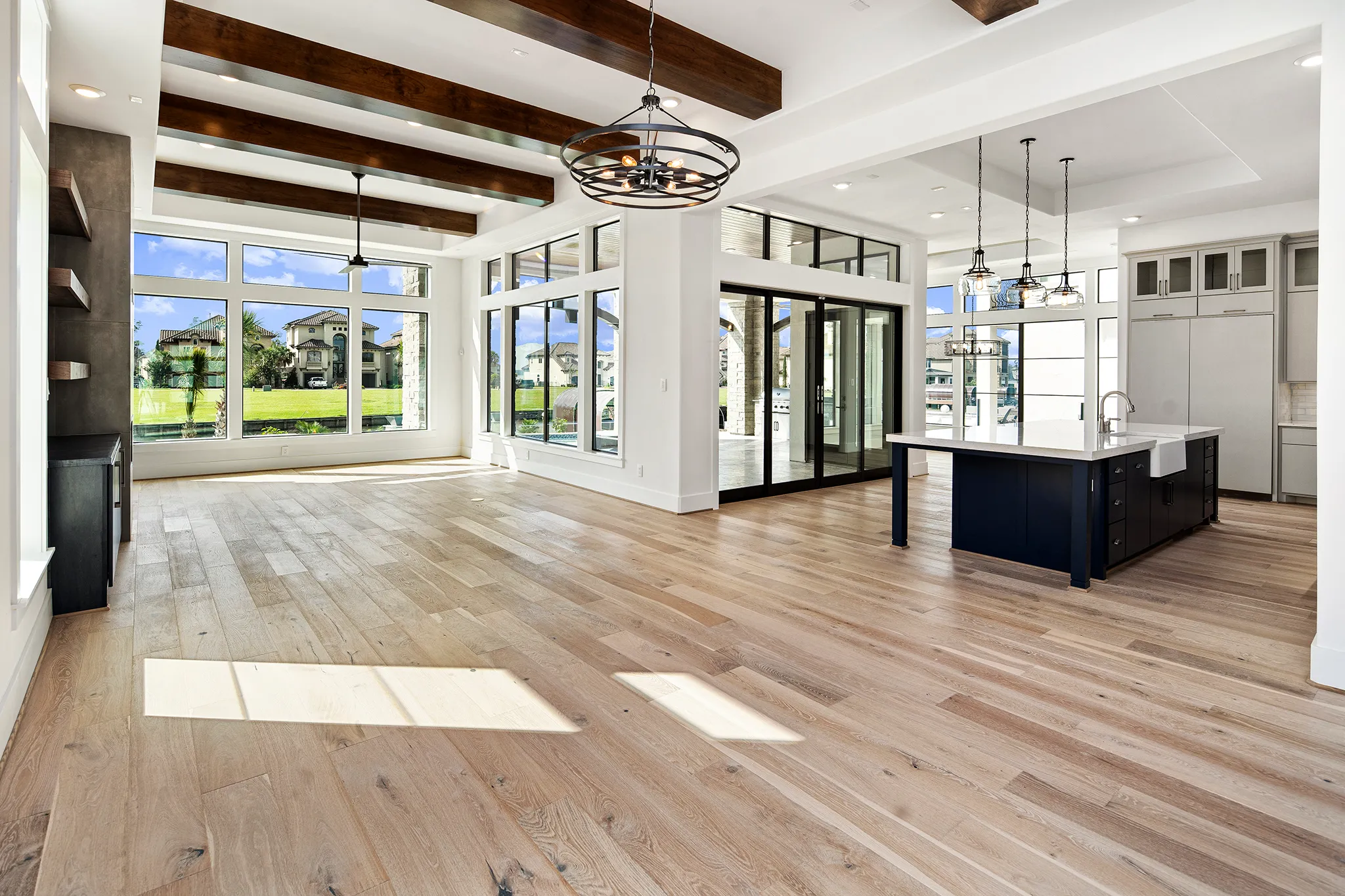 Lakeside covered living with pool and fire